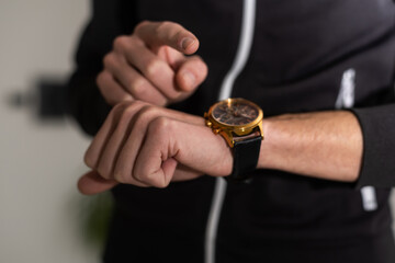 A watch on a man's hand of a man, a close-up of a man's watch on his hand