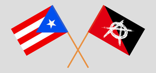 Obraz na płótnie Canvas Crossed flags of Puerto Rico and anarchy. Official colors. Correct proportion