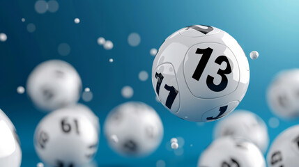 Close-up of lottery balls on blue background , with focus on ball with 13 lucky number - obrazy, fototapety, plakaty
