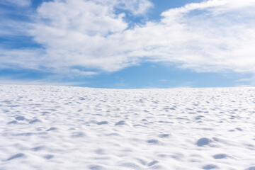 Abstract winter panorama with snowy ground and clear sky. Tuscany, Italy