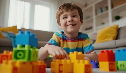young boy playing with blocks at his living room in the living room