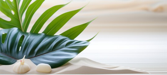 Minimalistic zen pattern in white sand with palm leaves for spa background and relaxation concept