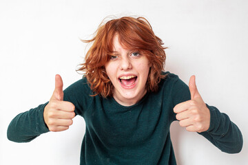 portrait of a pensive teenage girl with red hair with a stylish anime hairstyle