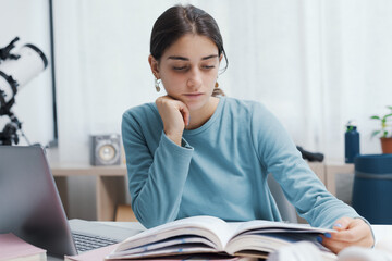 Smart student reading a book