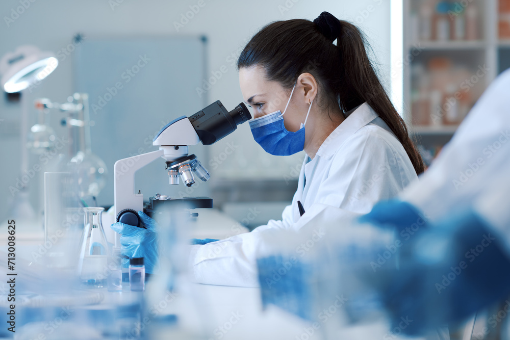 Wall mural confident scientist working in the science lab