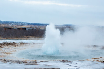 Geysir park erupting in Iceland in winter conditions