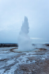 Geysir park erupting in Iceland in winter conditions