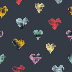 Seamless pattern with color hand drawn hearts on dark background. Vector