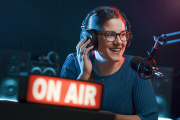 Presenter working at the radio station