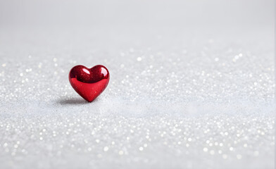 Fototapeta premium A small red heart on a sparkling white background. Generative AI