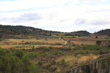 Fototapeta na wymiar The mountain range of Cuenca on a cloudy day of winter