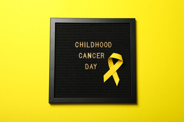 Black board with the inscription Childhood Cancer Day