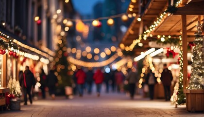 Defocused people walk through the Christmas market in the evening