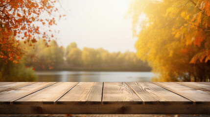 Empty blank wooden table fall background with autumn trees orange yellow color leaves backdrop forest or park nature scene abstract blurred bokeh tabletop for product display desk mockup. Copy space.