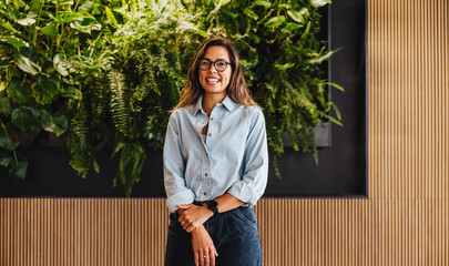 Young business woman working in a company with sustainable and eco friendly business values