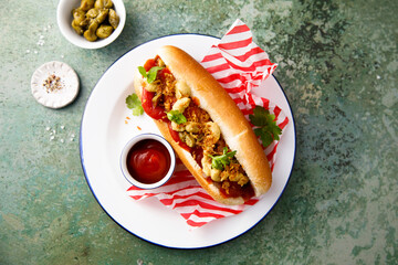 Traditional hot dog with pickles