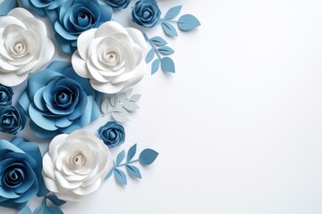 Paper flowers in blue and white colors on a white background