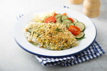 White fish fillet with garlic crumbs and rosemary