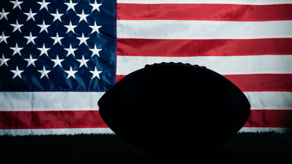 Silhouette of American football ball against usa flag