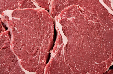 Beef steak texture. Raw meat full frame background. Close-up of raw steak. Fillet steak beef meat. Prime Boneless Hip Sirloin Steak
