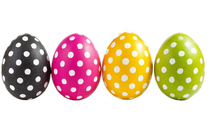 Colorful polka dot Easter eggs isolated on a transparent background.