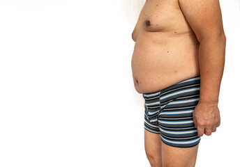 The left side view of the body and belly of a overweight older man isolated in white.