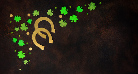 Golden Horseshoe, Gold Coins and Clover Leaves Shamrocks on Brown Background.