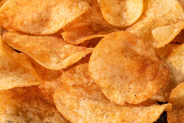 Close-up of delicious potato chip nachos with paprika seasoning