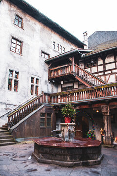 Inside yard the schattenburg castle in Feldkirch, Austria with fountain in the middle