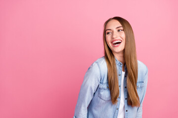Fototapeta premium Photo portrait of attractive young woman look laughing empty space wear trendy jeans clothes isolated on pink color background