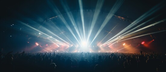 Electric Atmosphere of a Live Concert, Crowd Bathed in the Brilliant Glow of Stage Lights,...
