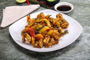 Vietnamese cuisine - fried frog with vegetables