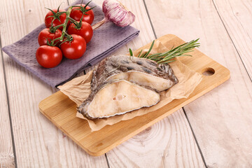 Raw wolffish steak for cooking