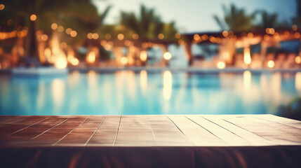 Wooden table pool bokeh background, empty wood desk product display mockup with blurry tropical hotel resort abstract poolside summer travel backdrop advertising presentation. Mock up, copy space.