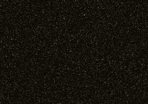 Black background with golden dust particles