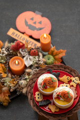 ハロウィーンの飾りとカボチャのプリン