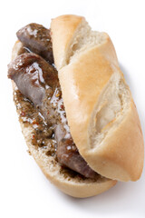 Traditional choripan, Argentina sandwich with chorizo and chimichurri sauce. isolated on white background	