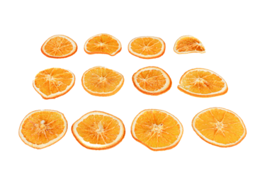 sliced dried oranges on a white isolated background close up