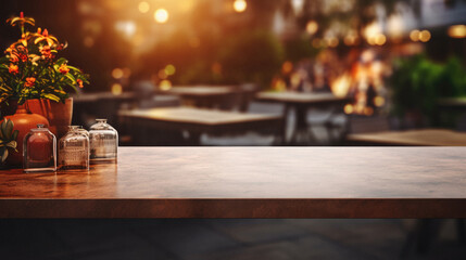 Wooden cafe table bokeh background, empty wood desk restaurant tabletop counter in bar or coffee shop surface product display mockup with blurry city lights backdrop presentation. Mock up, copy space. - obrazy, fototapety, plakaty