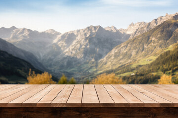 Wooden table mountains bokeh background, empty wood desk surface product display mockup with blurry nature hills landscape abstract travel backdrop advertising presentation. Mock up, copy space.