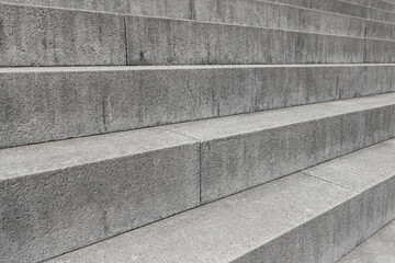 Abstract background image of cement stairs. Close-up view of the steps.