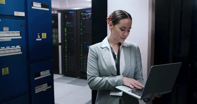 Business woman, server room and laptop for maintenance, system solution and data center coding or cybersecurity. Asian technician for computer engineering, software research or hardware inspection