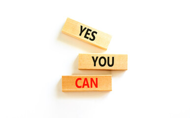 Motivational and Yes you can symbol. Concept words Yes you can on beautiful wooden blocks....