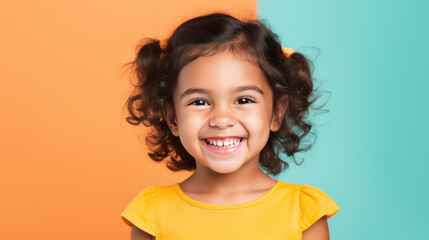 Cute little girl portrait on studio background