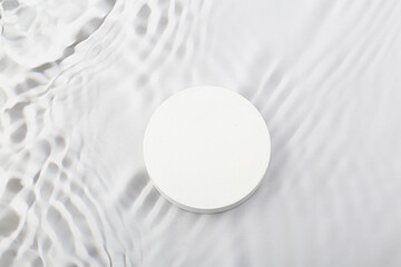 white wave abstract or rippled water texture background. white podium for products display