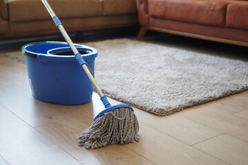 cleaning tiles floor with mop 