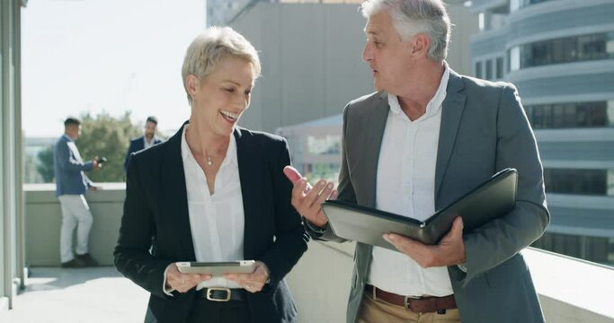 Team, planning and business people on tablet at rooftop in city, discussion and brainstorming on tech. Happy professional, man and woman on balcony, senior ceo and financial analyst walk in meeting
