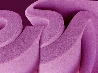 thick purple foam sponge material on a dark red background. stylish texture sheet and curved folds