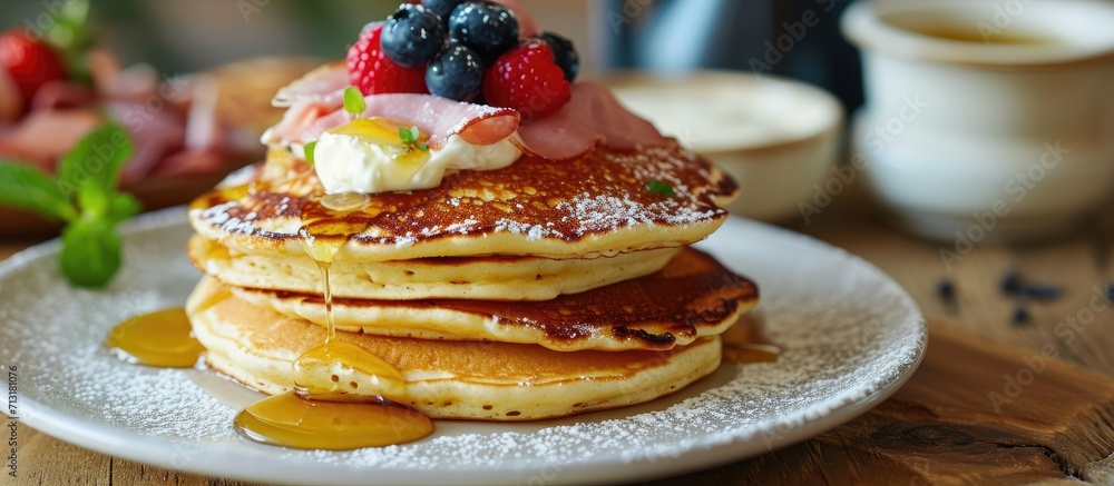 Poster gourmet pancakes stuffed with cream cheese and ham selective focus. copy space image. place for addi