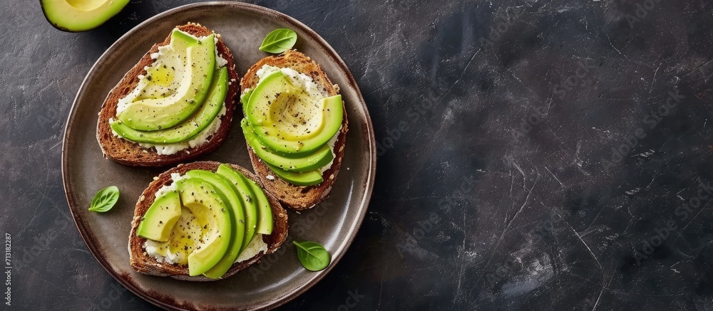 Canvas Prints avocado and cream cheese toasts on a plate and ingredients. Copy space image. Place for adding text